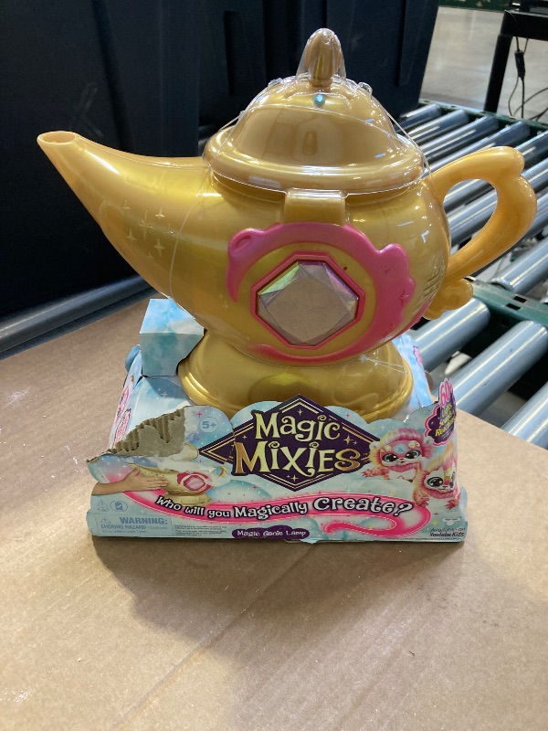 Photo 1 of Magic Mixies Magic Genie Lamp with Interactive 8" Pink Plush Toy and 60+ Sounds & Reactions. Unlock a Magic Ring and Reveal a Pink Genie from The Real Misting Lamp. Gifts for Kids, Ages 5+