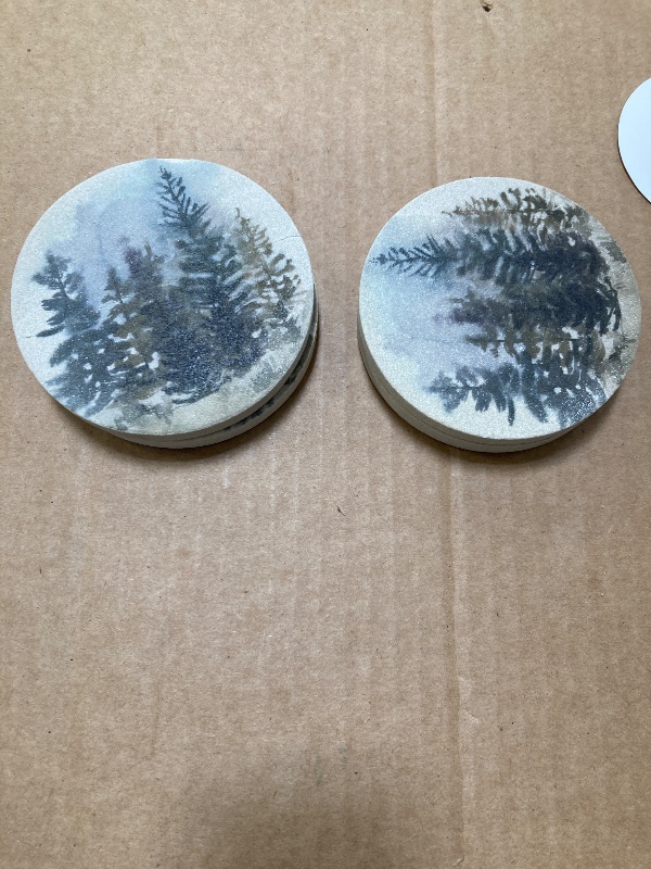 Photo 1 of Thirstystone Misty Treeline 3 Pack Round Natural Sandstone Coasters with Protective Cork Backing Manufactured in The USA