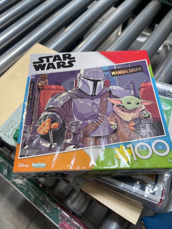 Photo 1 of Buffalo Games - Star Wars - The Mandalorian and The Child - 100 Piece Jigsaw Puzzle for Families -Challenging Puzzle Perfect for Game Nights - Finished Size is 15.00 x 11.00