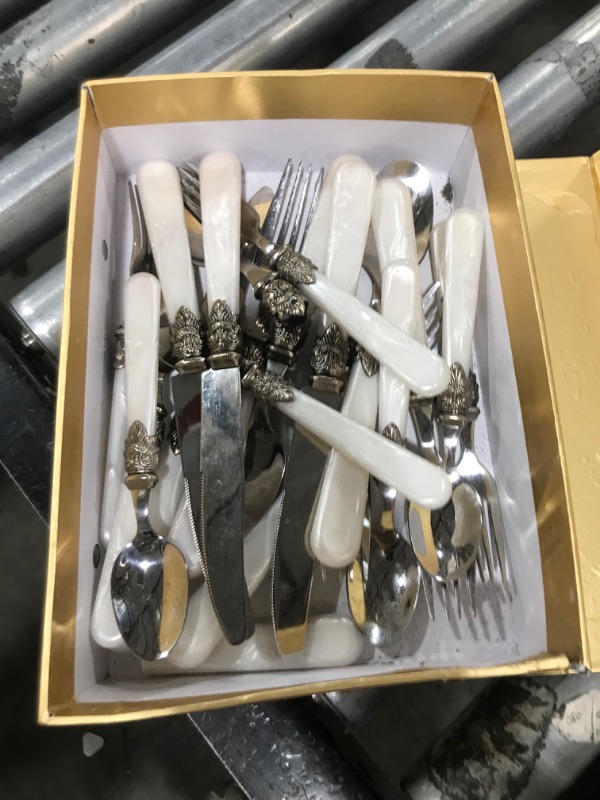 Photo 1 of CATHYLIN 20-piece 18/10 Stainless Steel Vintage Flatware set With White Handle,Sliverware set Service for 4,Dishwasher safe (20, Pearl White)