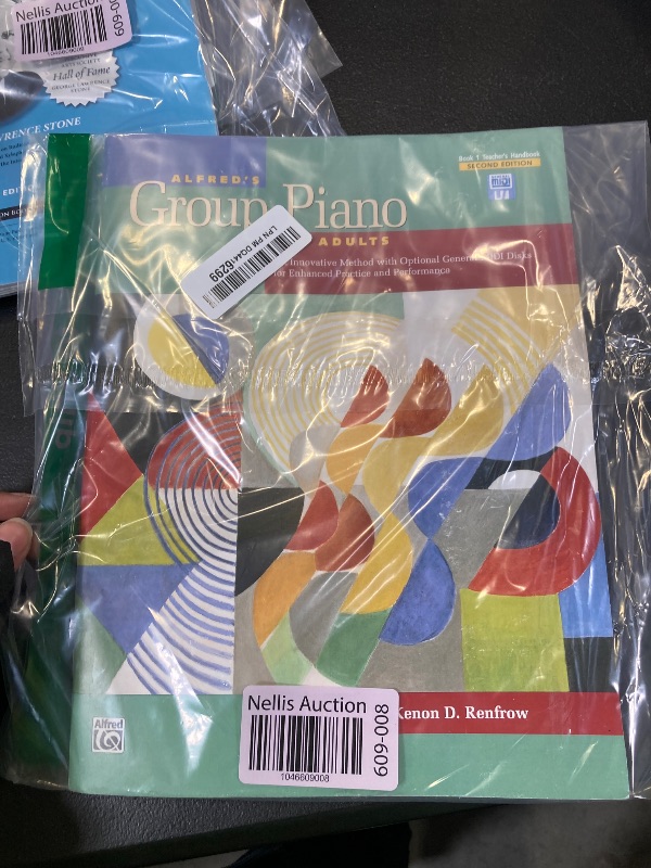 Photo 1 of Alfred's Group Piano for Adults Teacher's Handbook, Bk 1: An Innovative Method with Optional General MIDI Disks for Enhanced Practice and Performance (Alfred's Group Piano for Adults, Bk 1)