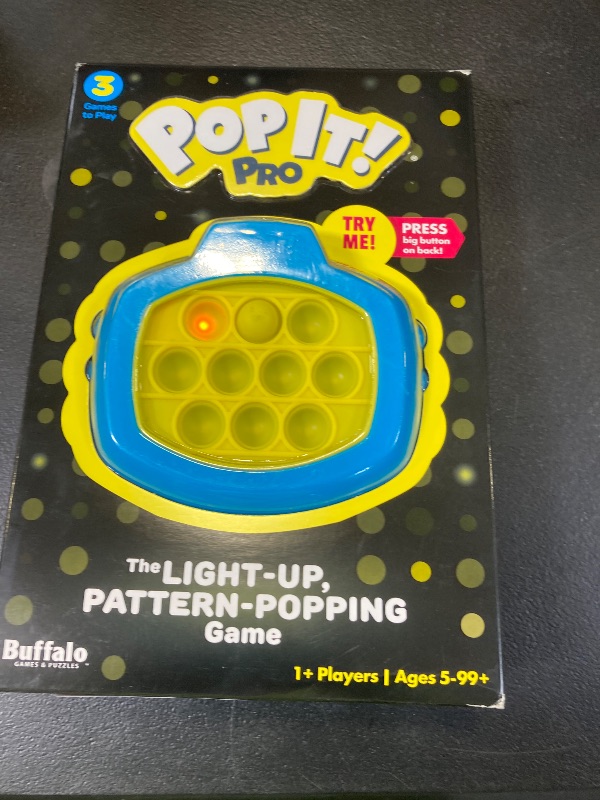 Photo 1 of Pop It! Pro - The Original Light Up, Pattern Popping, Pop It! Game from Buffalo Games,Blue and Yellow