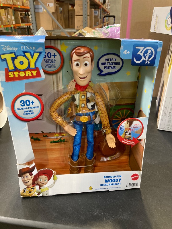 Photo 1 of Mattel Disney Pixar Toy Story Talking Woody Action Figure & Accessory, Roundup Fun 12-inch Collectible with 30+ Sounds & Phrases