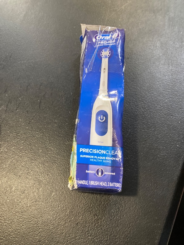 Photo 1 of Oral-B Pro 100 Precision Clean, Battery Powered Electric Toothbrush, Blue and White