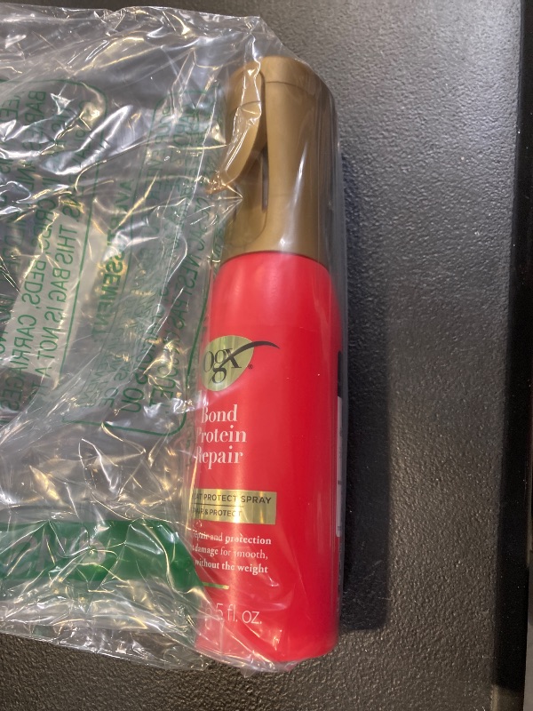 Photo 1 of OGX Repair & Protect Bond Protein Repair 450°F Heat Protect Spray, Thermal Protection Spray for Targeted Damage Repair & Protection from Heat Damage, 6.5 fl. oz