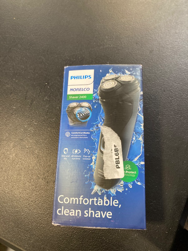 Photo 1 of Philips Norelco Shaver 2400 Series, Wet and Dry Electric Shaver, Pop-up Trimmer, P-Cap, Deep Black, Model X3001/90