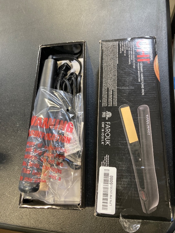 Photo 1 of CHI Original Ceramic Flat Iron, Hair Straightener For A Smooth Finish, Floating Plates, Quick Heat Up, Analog On/Off Switch, 1" Styling Tool, Black