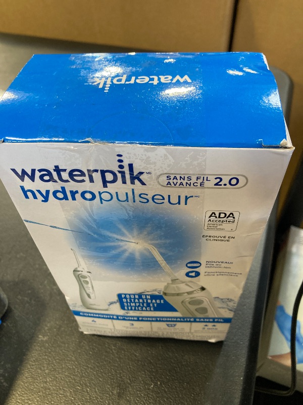 Photo 1 of Waterpik Cordless Advanced 2.0 Water Flosser For Teeth, Gums, Braces, Dental Care With Travel Bag and 4 Tips, ADA Accepted, Rechargeable, Portable, and Waterproof, White WP-580, Packaging May Vary