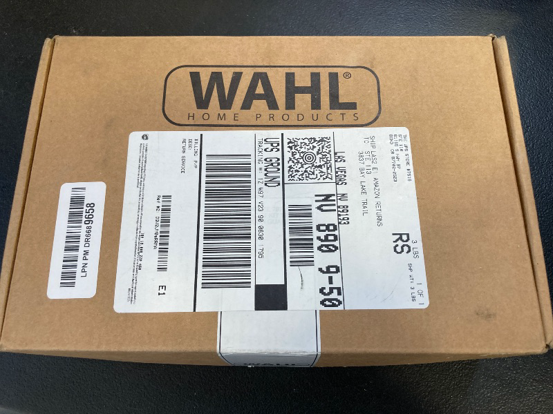 Photo 1 of Wahl Home Haircutting Corded Clipper Kit with Adjustable Taper Lever, and 10 Color Coded Guards for Easy Clipping & Trimming - Model 79722