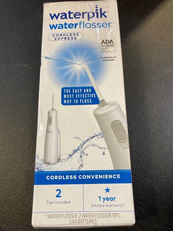 Photo 1 of Waterpik Cordless Express Water Flosser, Battery Operated & Portable for Travel & Home, ADA Accepted, Waterproof for Shower Use, White WF-02, Packaging May Vary