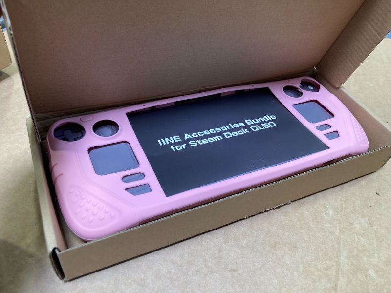 Photo 1 of IINE Protective Case for Steam Desk OLED, Steamdesk OLED Silicone Cover Case, 9-in-1 Protective Silicone Shell with Anti-Scratch Cover Protector, Steam Deck OLED Accessories Set,Pink