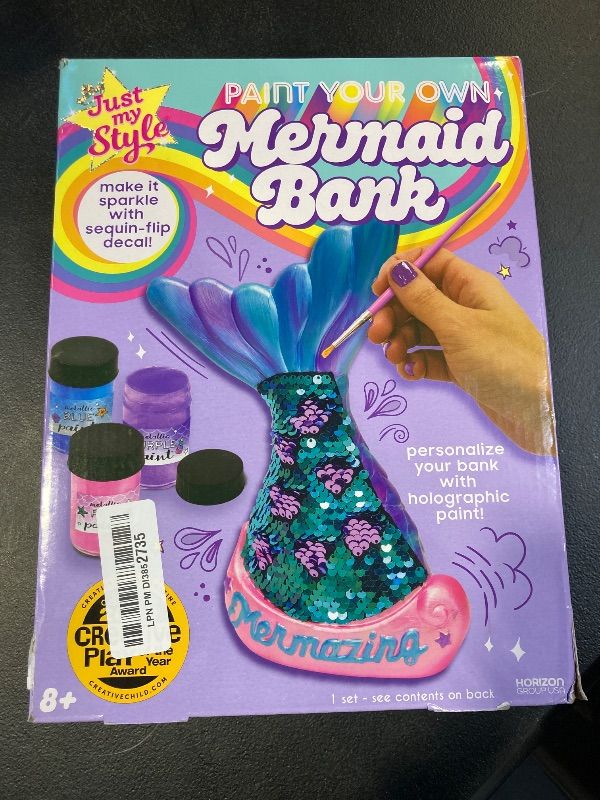 Photo 1 of Just My Style Paint Your Own Mermaid Bank by Horizon Group USA. Paint & Decorate Your Own Coin Bank with Color Changing Sequin Decal & Metallic Holographic Paints, Blue