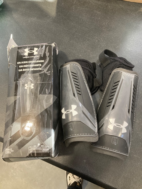 Photo 1 of UA Challenge Shin Guard YTH Black/Castle Rock L