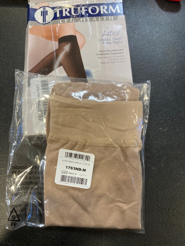 Photo 1 of Truform Sheer Compression Stockings, 8-15 mmHg, Women's Knee High Length, 20 Denier, Nude, Medium