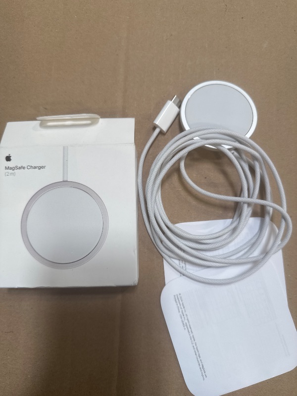 Photo 1 of Apple MagSafe Charger - Wireless Charger with Fast Charging Capability, Compatible with iPhone and AirPods
