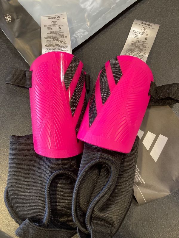 Photo 1 of adidas Unisex-Kids Tiro Match Shin Guards, Black/Team Shock Pink, Small