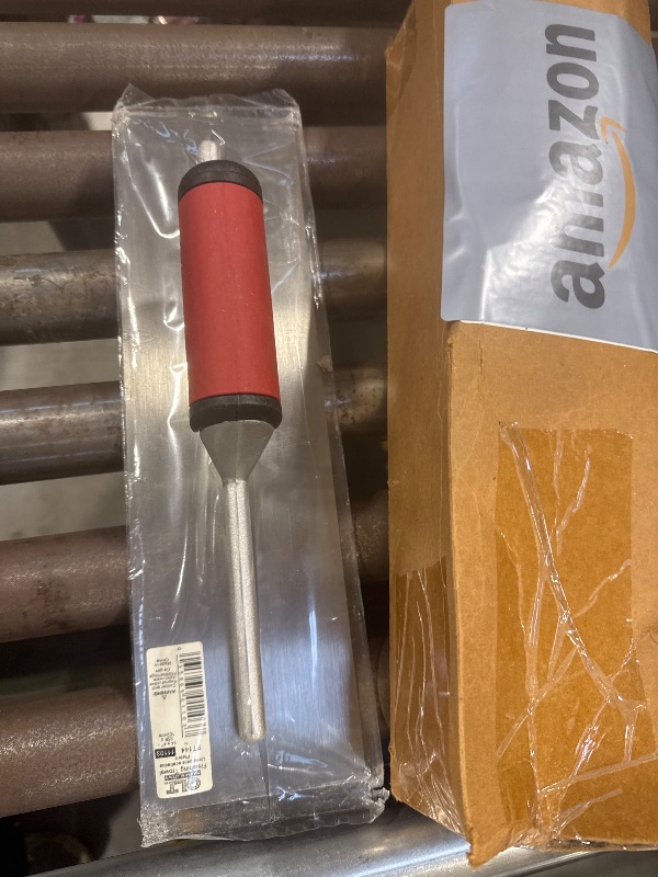 Photo 1 of Marshalltown Finishing Trowel, 16 by 4 Inch, Perfect for Spackling, Sheetrock, Stucco, Concrete, EIFS and More, DuraSoft Curved Handle, High Carbon Steel Blade, Xtralite Mounting, MXS66D