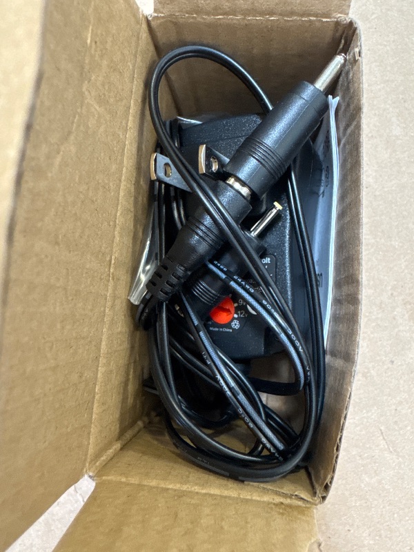 Photo 1 of Basicvolt Universal AC/DC Adapter Multi-Voltage Regulated Switching Power Supply with 11 Selectable DC Plugs for 3V 4.5V 5V 6V 7.5V 9V 12V Household Electronics 2.0A 24Watt Max
