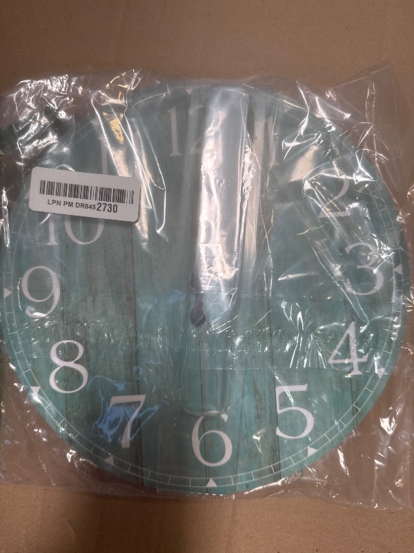Photo 1 of HYLANDA 12 Inch Teal Wall Clock - Silent, Non-Ticking, Battery Operated, Turquoise, Decorative, Unisex