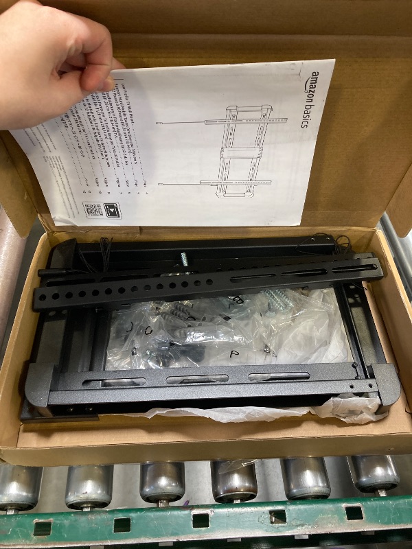 Photo 1 of Amazon Basics Low Profile TV Wall Mount with Horizontal Post Installation Leveling for 32 to 86 inch TVs, Black