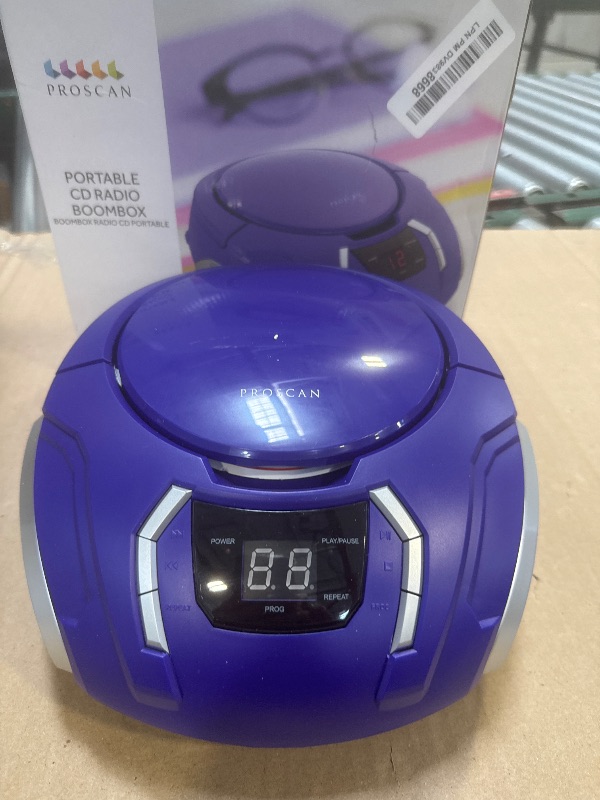 Photo 1 of Proscan Elite Portable CD Boombox with AM/FM Radio, Auxiliary - Purple