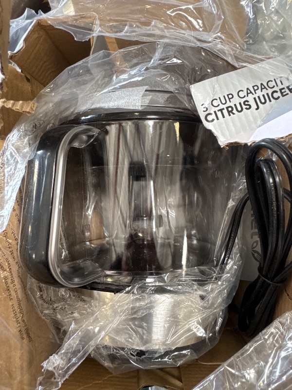 Photo 1 of Elite Gourmet ETS623 BPA-Free Electric Citrus Juicer, Compact, Large Volume, Pulp Control, Oranges, Lemons, Limes, Grapefruits with Easy Pour Spout, 24oz, Black/Stainless Steel