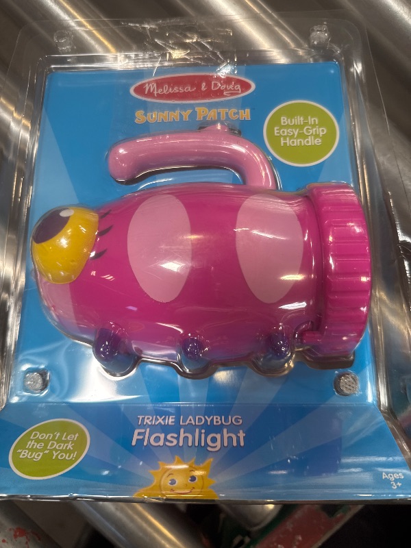 Photo 1 of Melissa & Doug Sunny Patch Trixie Ladybug Flashlight With Easy-Grip Handle , Pink
