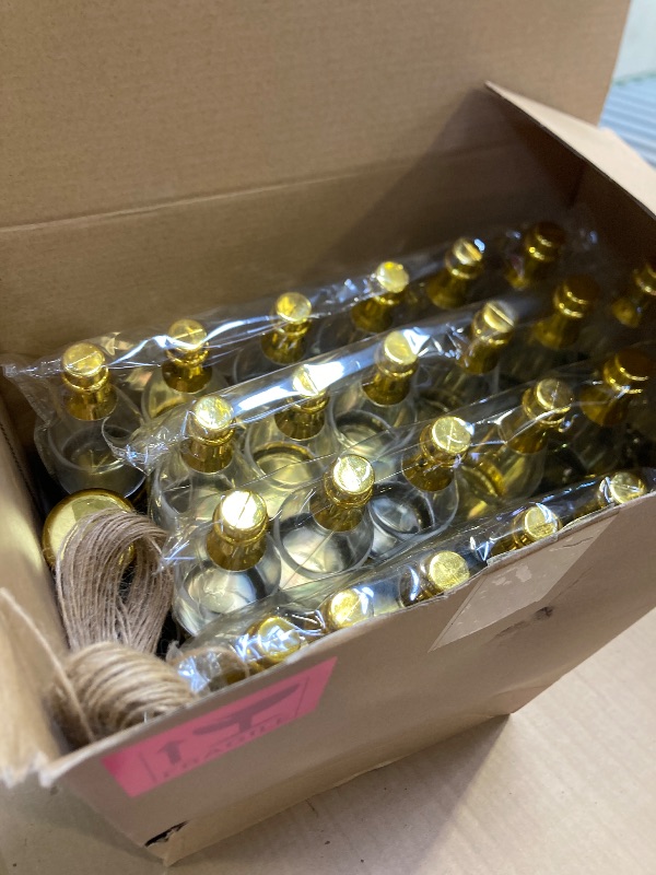 Photo 1 of Gerrii 100 Pcs Metallic Mini Champagne Bottle Candy Container Shaped Jars Gold Plastic DIY Favor Candy Bottle Wedding Party Favor Containers with Gift Tags Gold Strings and 65.6ft Rope