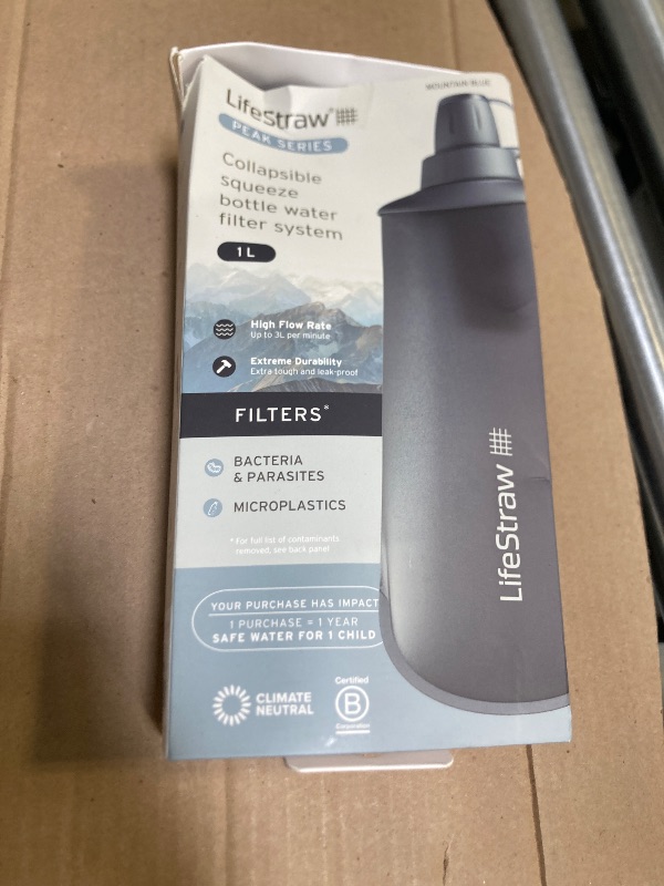 Photo 1 of LifeStraw Peak Series - Collapsible Squeeze Bottle Water Filter System - 1L for Trail Running, Camping, Hiking, Travel, Cycling, and Fishing; Mountain Blue