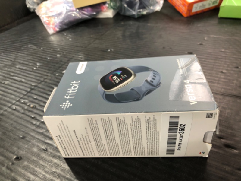 Photo 1 of Fitbit Versa 4 Fitness Smartwatch with Daily Readiness, GPS, 24/7 Heart Rate, 40+ Exercise Modes, Sleep Tracking and more, Waterfall Blue/Platinum, One Size (S & L Bands Included)