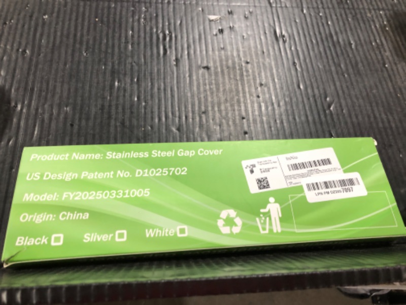 Photo 1 of Stainless Steel Stove Gap Covers,Stove Gap Filler, Range Trim Kit, Stove Gap Guards, Heat Resistant and Easy to Clean, Easy retractable Length 13.8" to 27.5", Width 0.79",Black(2PCS)