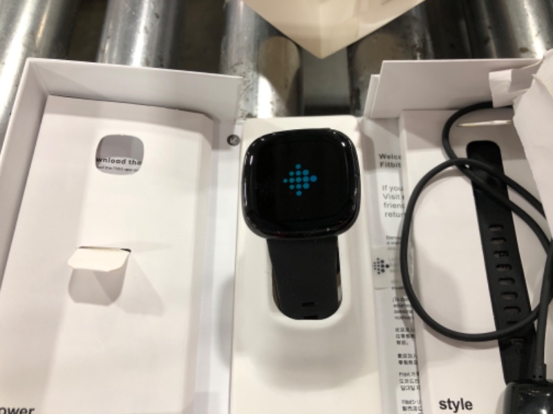 Photo 1 of Fitbit Sense Advanced Smartwatch with Tools for Heart Health, Stress Management & Skin Temperature Trends, Carbon/Graphite, One Size (S & L Bands Included)