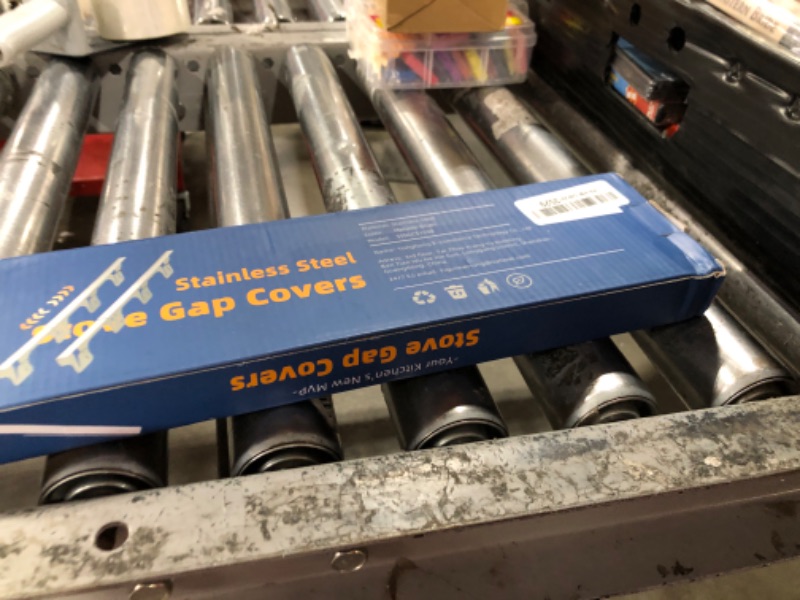 Photo 1 of SZJHXIN Stove Gap Filler, Stove Gap Covers Stainless Steel, Adjustable 13.8-27.5 In(2 Pack), Heat Resistant, Gas Stove Side Gap Protector, Silver
