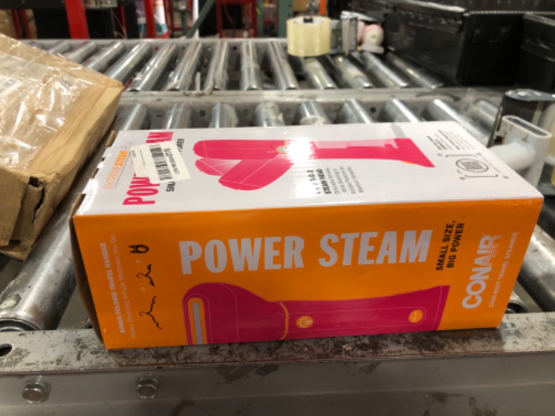 Photo 1 of Conair Handheld Garment Steamer for Clothes - Power Steam: Small Size, Big Power - Great for Home, Office, or Travel with Dual Voltage for Worldwide Use, Pink