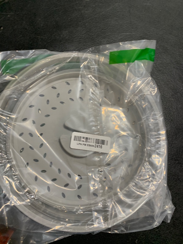 Photo 1 of CasaCulina 2 In 1 Microwave Splatter Cover & Silicone Mat, Vented Collapsible Microwave Cover for Food, Splatter Guard Dish Plate Lid, Kitchen Colander, 10 Inch Round Silicone Trivet Mat (Grey)