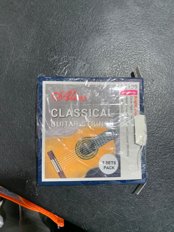 Photo 1 of Classical Guitar Strings, Alice 2 Set Classic Guitar 6 Strings Clear Nylon Normal Tension 28-43 Gauge with Anti-Rust Coating, Silver Plated Wrap (AC130)