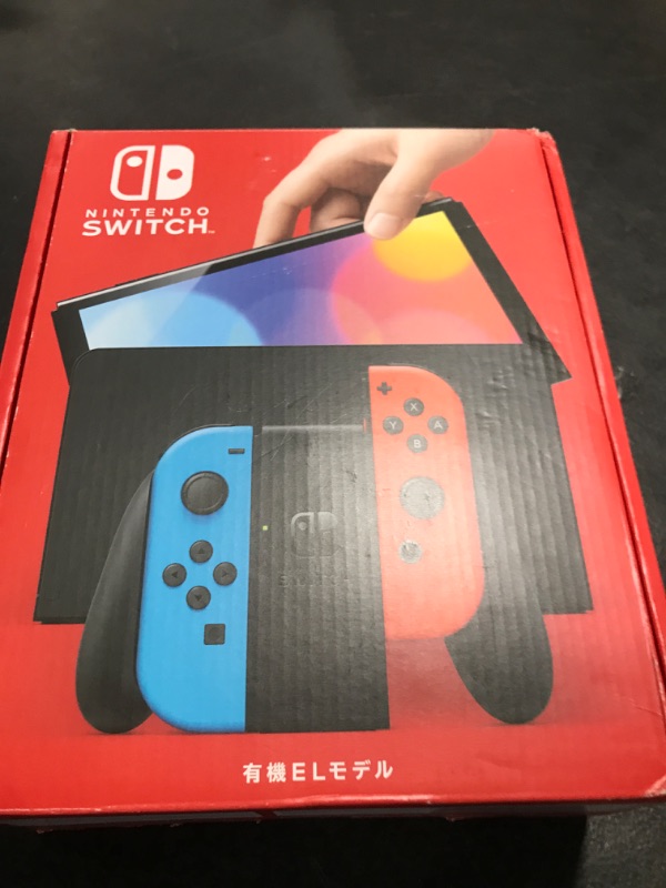 Photo 1 of Nintendo Switch – OLED Model w/ Neon Red & Neon Blue Joy-Con