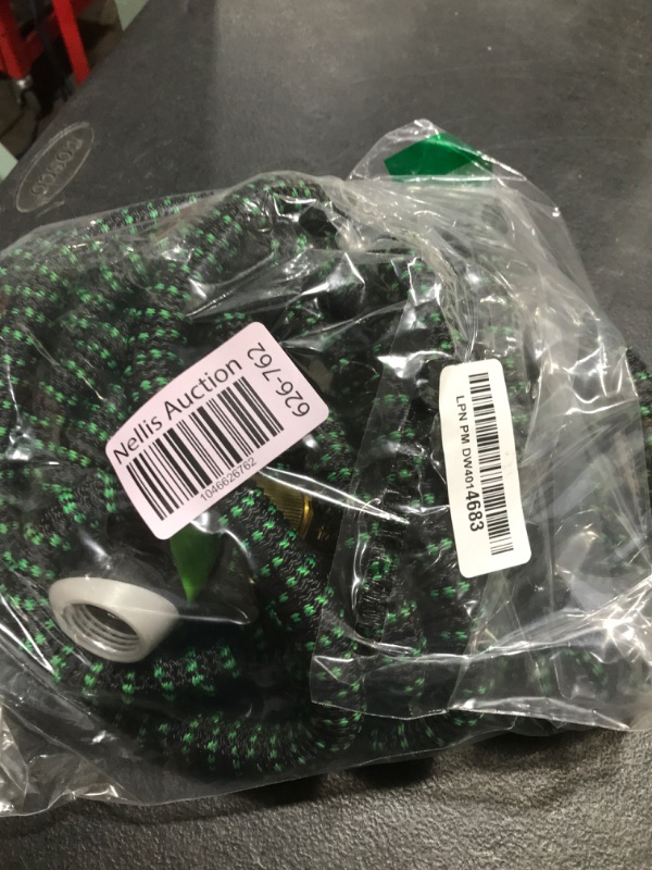 Photo 1 of Garden Hose 50 FT, NON-EXPANDABLE Heavy-Duty Flexible & Lightweight Water Hose with 10-Function Nozzle, No-Kink Design, Leak-Proof Super Fabric, Solid Fittings for Lawn, Car, RV