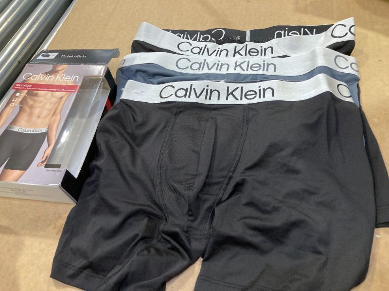 Photo 1 of Calvin Klein Men`s Microfiber Boxer Briefs Pack of 3 (Black(NP2214-051)/Grey, Medium)