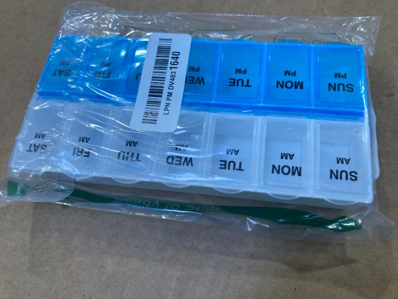Photo 1 of Amazon Basic Care (7-Day) AM/PM Pill Organizer, Vitamin Case, And Medicine Box, Large Compartments, 2 Times a Day, Blue and Clear Lids