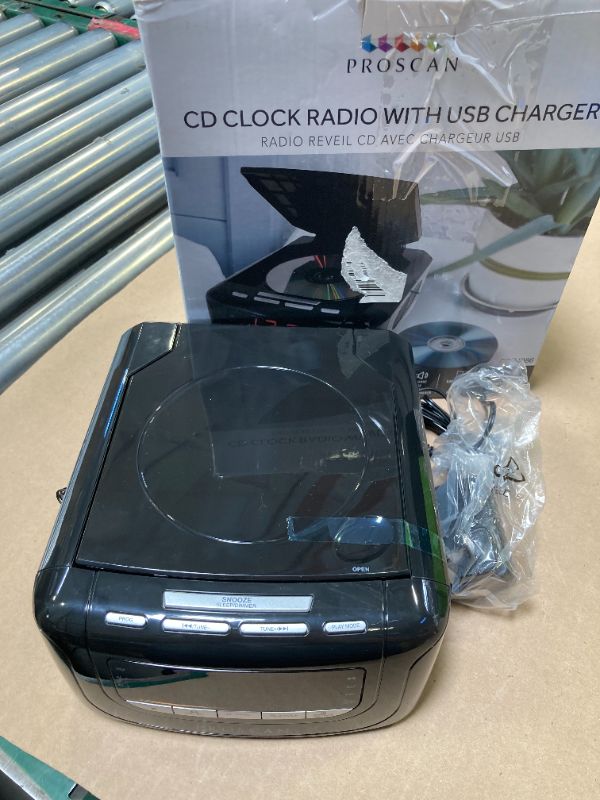 Photo 1 of Sylvania SCR4986 Alarm Clock Radio with CD Player and USB Charging, Black