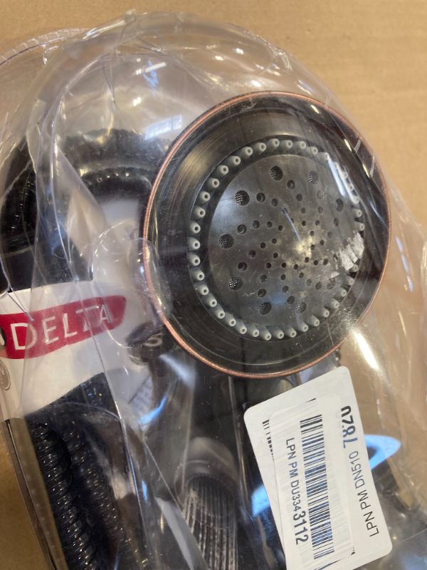 Photo 1 of Delta Faucet 5-Spray Hand Held Shower Head with Hose, Venetian Bronze 75520RB140
