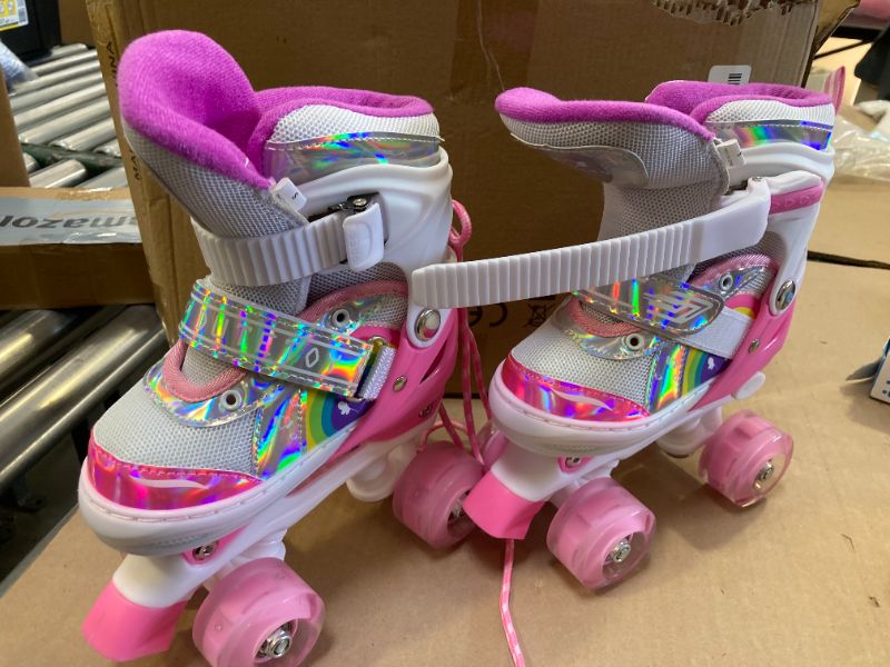 Photo 1 of ERNAN Kids Roller Skates,Girls Roller Skates,4 Size Adjustable with Light up Wheels for for Beginner Kids Girls & Boys (Rainbow A, S)
