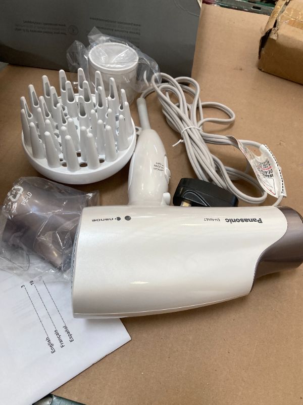 Photo 1 of Panasonic Nanoe Salon Hair Dryer with Oscillating QuickDry Nozzle, Diffuser and Concentrator Attachments, 3 Speed Heat Settings for Easy Styling and Healthy Hair - EH-NA67-W (White)