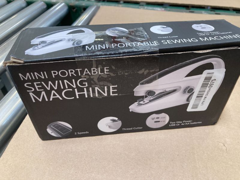 Photo 1 of Handheld sewing machine, portable, mini sewing machine, easy to use, fast sewing speed, suitable for sewing clothes, fabric, DIY Home machine for beginners(Black)