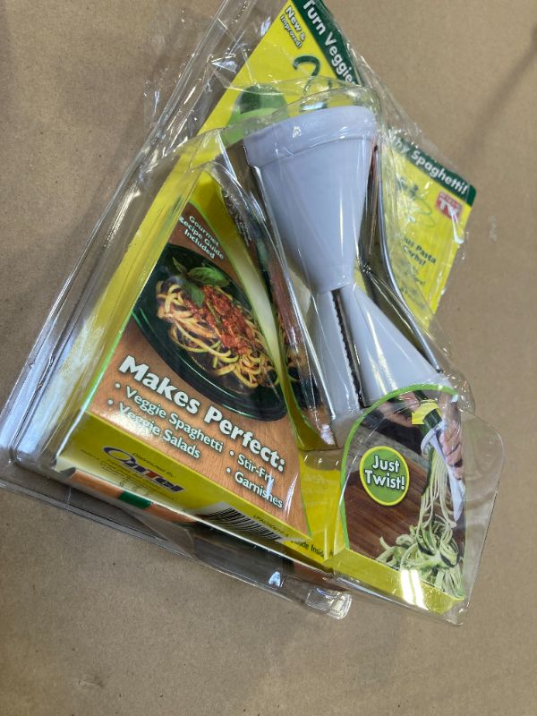 Photo 1 of Veggetti Veggie Slicer, Dual Stainless Steel Blade Vegetable Cutter for Thick or Thin Noodle, Works with Zucchini, Squash, Cucumbers, Carrots, and more, 2.76"L x 2.76"W x 6.32"H, White