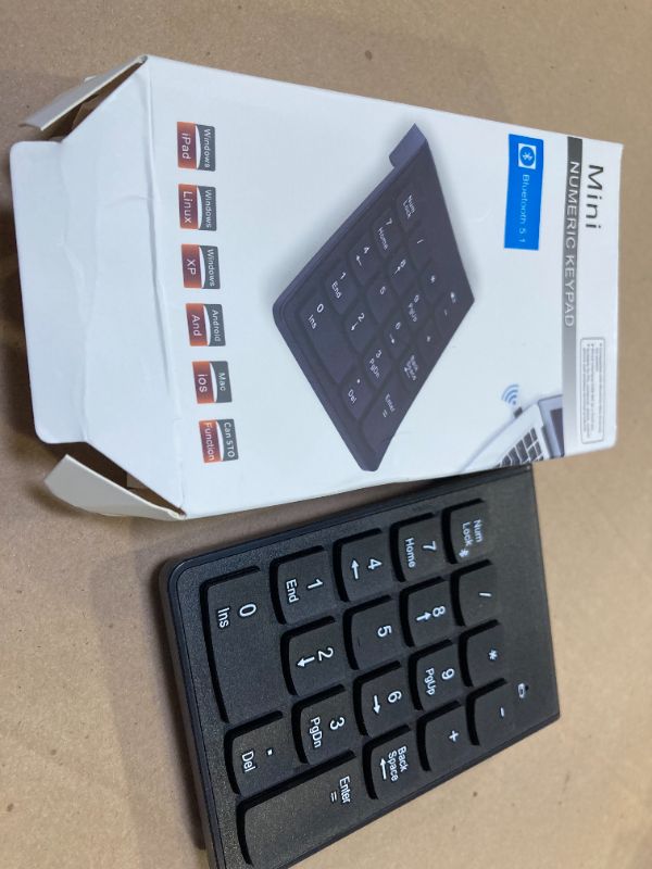 Photo 1 of Bluetooth Numeric Keypad – Portable Number Pad Keyboard for Laptop, PC Computers, Desktop | Essential Laptop Accessories Numpad for ChromeBook Surface Notebook Efficient Office Accountant Data Entry