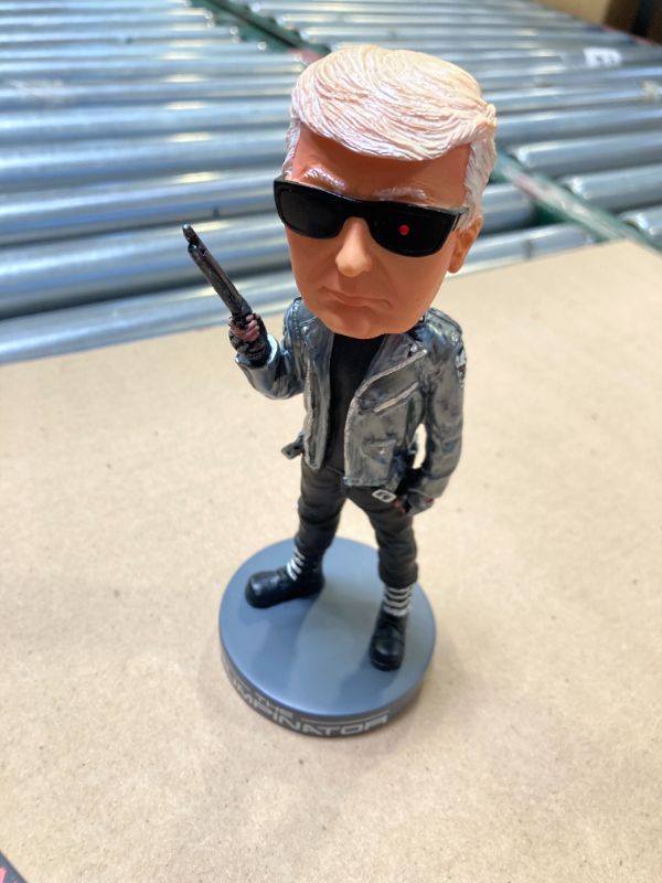 Photo 1 of Donald Trump Collectibles - Proud Patriots The Trumpinator: Donald Trump 2024 Bobblehead for Trump Supporters and Patriotic Americans | The #1 Trump Gifts