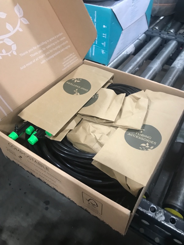 Photo 1 of CARPATHEN Drip Irrigation System - Adjustable Premium Irrigation System for Garden, Raised Beds - Complete Drip Irrigation Kit with Drip Emitters, 5/16" and 1/4" Irrigation Tubing and Barbed Fittings