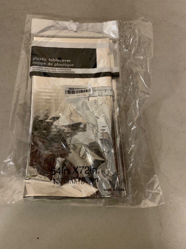 Photo 1 of 2pcs Silver Plastic Tablecloth for Parties 54*72inch Shiny Disco Table Cloths White Table Cover for Wedding Christmas Winter Birthday Party Decoration Anniversary Event Dinner Grad Party Supplies